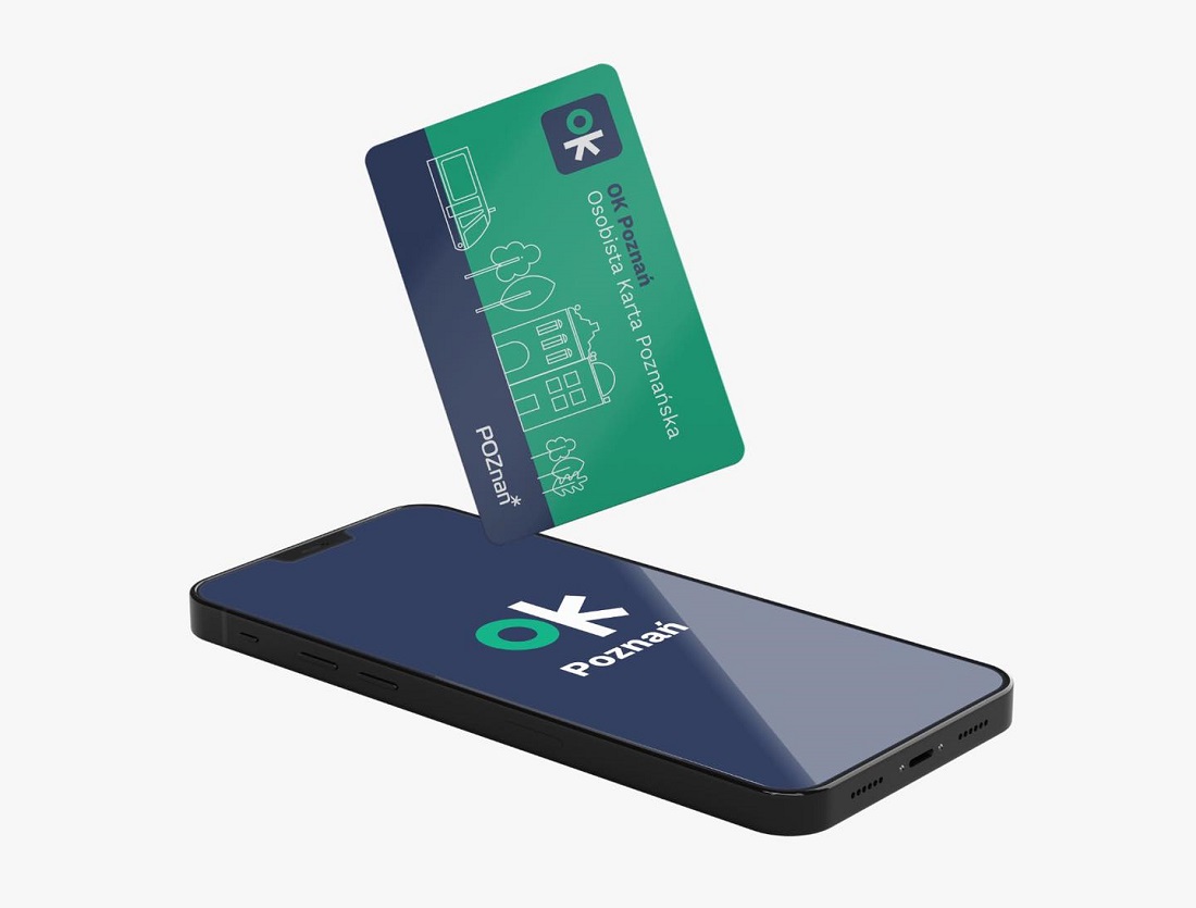 Baner reklamujący kartę OK Poznań w formie karty i aplikacji mobilnej, widoczna karta i smartfon - grafika artykułu