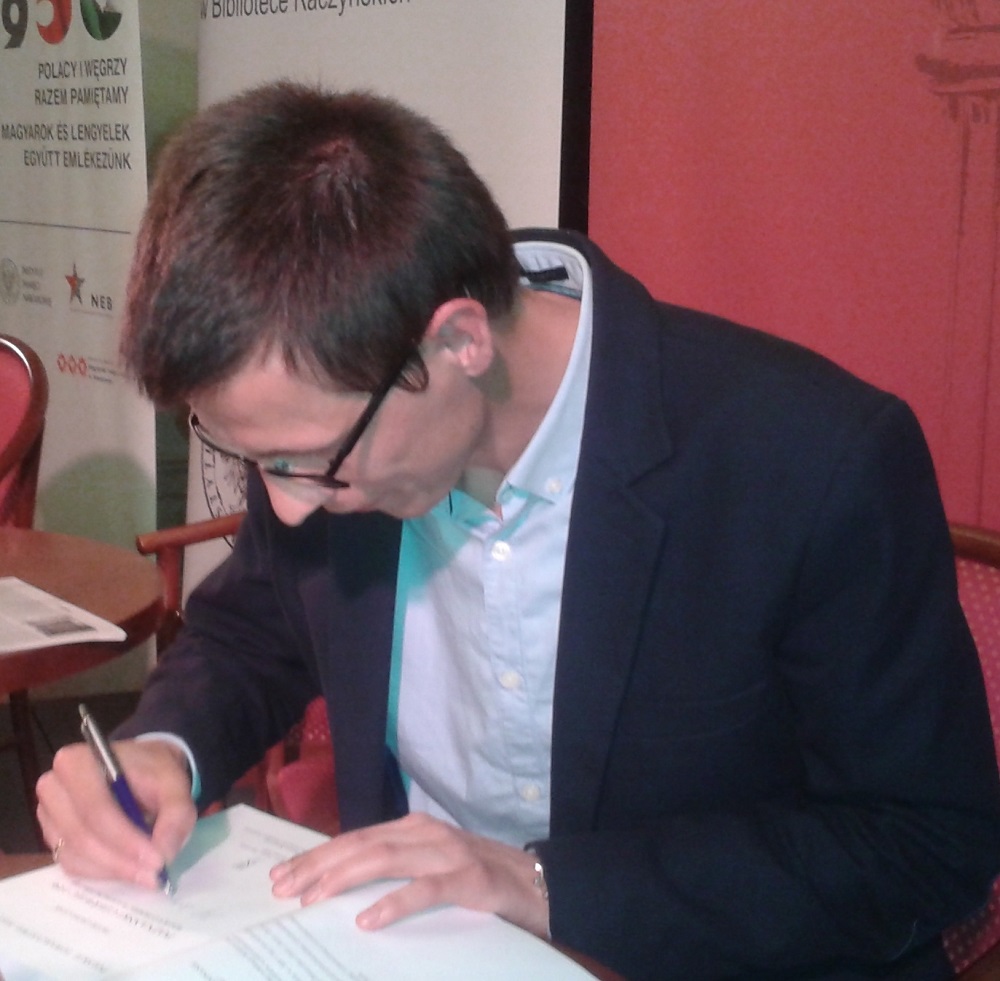 Autor podczas promocji książki w Bibliotece Raczyńskich - grafika artykułu