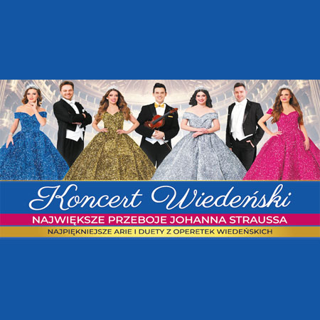 Na zdjęciu 7 postaci stojących na scenie dużego teatru. W tle widoczne miejsca dla publiczności.