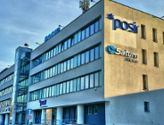 kilkupiętrowy budynek biurowy o prostej architekturze - grafika artykułu