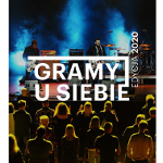 Grupa artystów na scenie, napis: "Gramy u Siebie"
