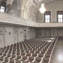 Black and white photo of chairs rows in AMU Auditorium