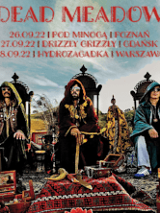 Baner z nazwą zespołu i zdjęciem artystów.