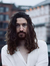 Baner promujący wydarzenie. Nazwa wydarzenia i zdjęcie artysty.