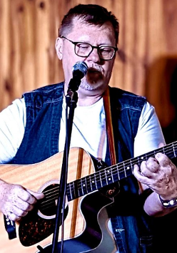 Baner promujący wydarzenie. Nazwa wydarzenia i zdjęcie artysty.