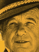 Na grafice, na żółtym tle twarz ks. Józefa Tischnera w czapce góralskiej.