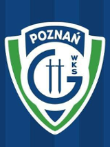 Herb Enea WKS Grunwald Poznań - 2 niebieskie miecze w literze G na białym tle. Powyżej biały napis z nazwą miasta na niebieskim tle. Całość wpisana w zielone tło z białym obramowaniem, a cały herb na niebieskim tle