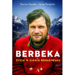 Maciej Berbeka na tle gór.