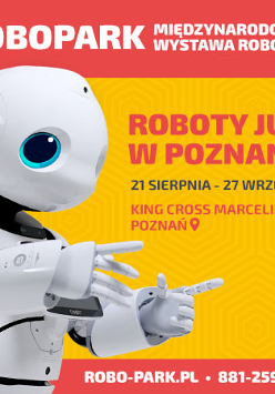 Po lewej biały robot z głową, oczami i rękoma, po prawej npisy na żółtym tle.