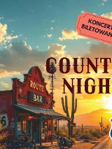 Plakat, który promuje koncert "Route 66 - Country Night". Zdjęcie przydrożnego baru, obok którego rosną kaktusy. W tle zachodzące słońce. Napisy, które informują o wydarzeniu.