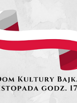 Wstęga w barwach narodowych, pod którą umieszczono napis Dom Kultury Bajka, 8 listopada godz. 17.:00