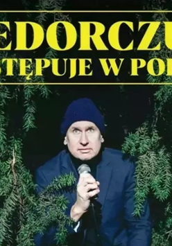 Plakat występu Wojtka Fiedorczuka, ze zdjęciem artysty.