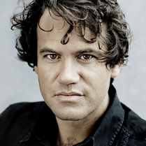 na zdjęciu twarz dyrygenta Eivinda Gullberga Jensena.