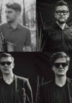 Na czarno-białym zdjęciu członkowie zespołu wykonawców.