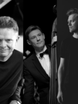 Na czarno-białym zdjęciu członkowie zespołu.