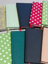 zestaw kolorowych notesów