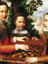 3 osoby przy szachownicy.