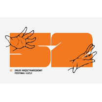 Dłonie na tle pomarańczowego napisu (liczba 52)