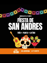 Na czarnym tle widnieje kolorowy girlandowy baner z motywami meksykańskimi. Centralnie umieszczony biały napis: "Fiesta de San Andres" z dopiskiem "Andrzejki w La Planete" oraz "Trio Punto Latino" z ikonami czaszek. Na dole znajduje się gitara, czaszka ozdobiona kwiatami, dwa marakasy i drink. W pasku na dole, na pomarańczowym tle, podano informacje o wydarzeniu zawarte w treści artykułu.