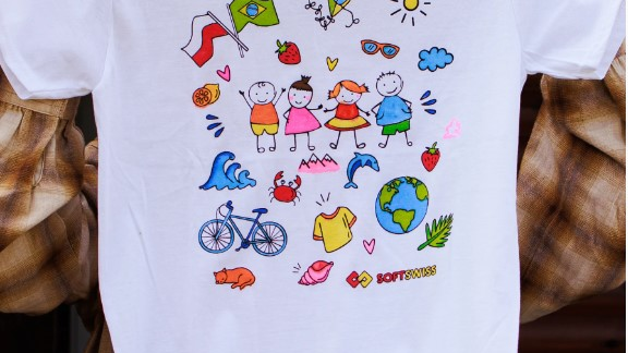 hand-made painted white t-shirt with Brazilian and Polish flag and people and decorations