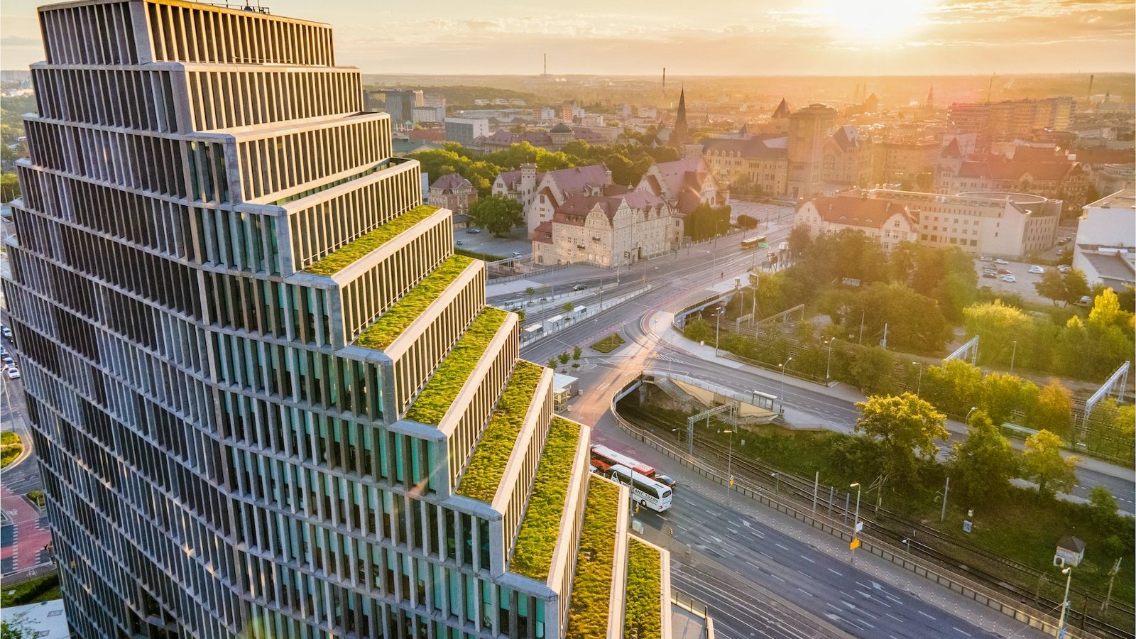 View of the Bałtyk building. Kaponiera Roundabout behind the building, shining sun