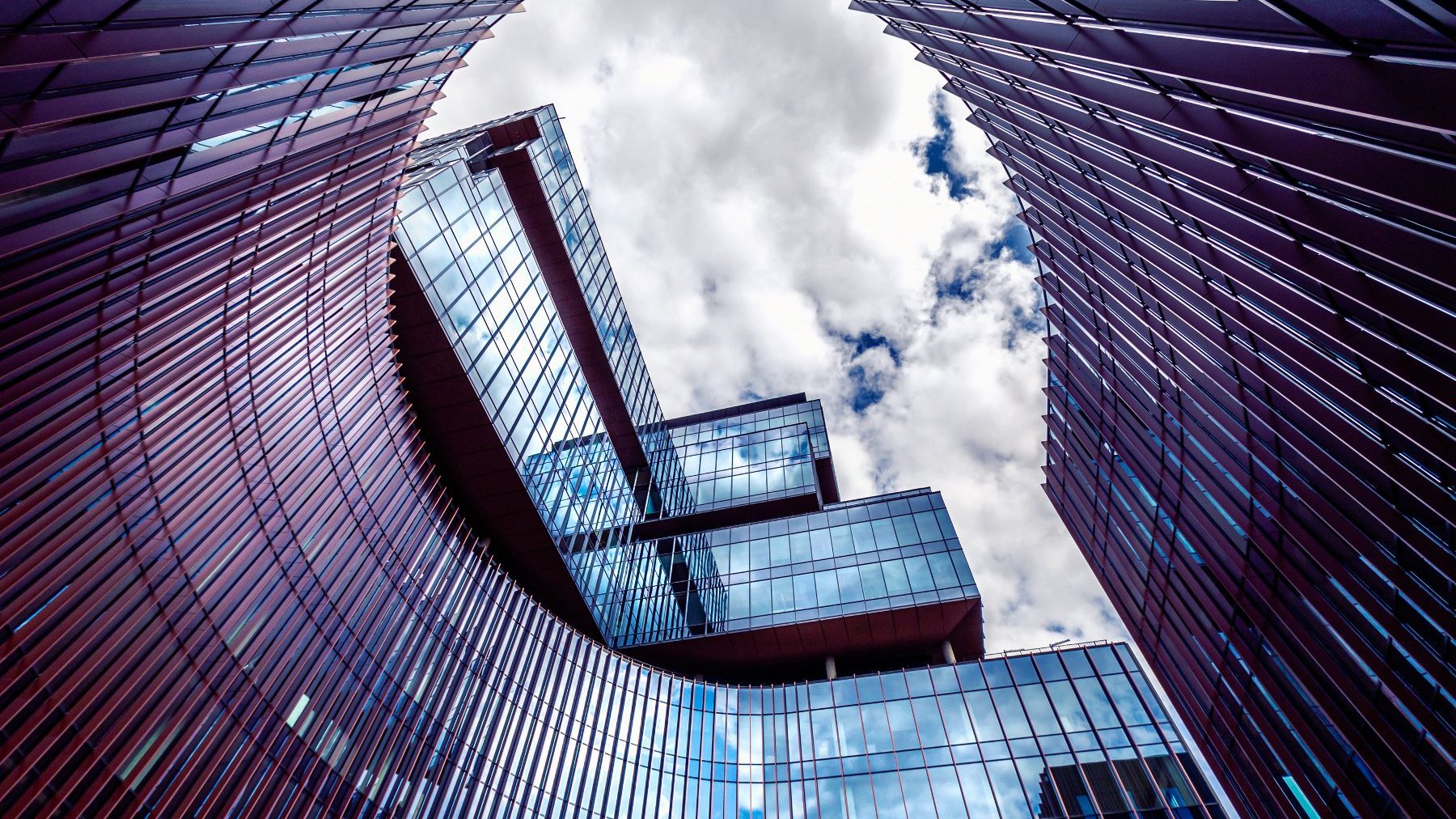 glass buildings of Nowy Rynek. clouds in the sky