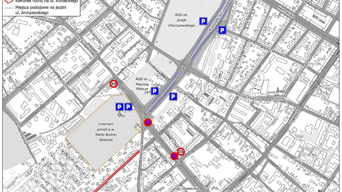 Obraz przedstawia czarno-białą mapę okolic cmenatrza na Górczynie z zaznaczonymi na czerwono zmianani w organizacji ruchu
