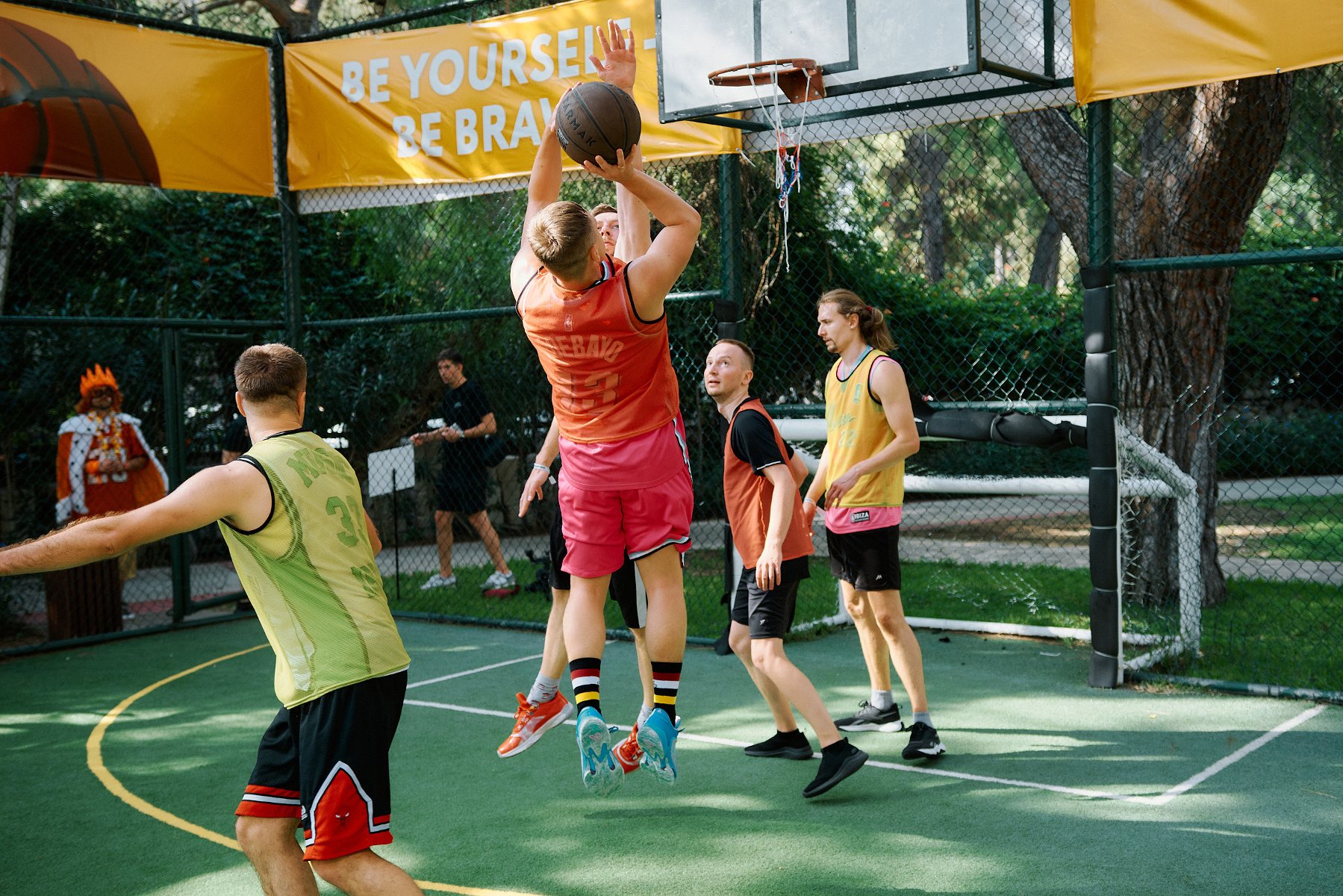 Employees play the basketball