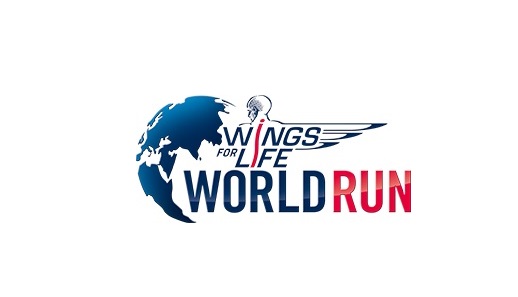 Logotyp Wings for Life World Run - biała postać ze skrzydłami łączy się z kulą ziemską, a także z granatowo-czerwoną nazwą imprezy