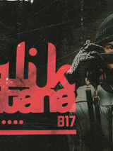 Na plakacie zdjęcie artysty, mężczyzny w czarnym stroju, trzymającego oburącz okulary przed twarzą. Z lewej strony czerwone napisy, szczegóły na temat wydarzenia zawarte w treści artykułu. Tło czarno-czerwone. Na plakat naniesiony efekt jakby zdjęcie było postarzone lub lekko zniszczone.