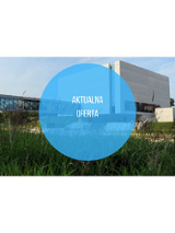 Brama Poznania. Na środku niebieskie koło i biały napis.