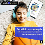Plakat ze zdjecem chłopca ze słuchawkami na uszach