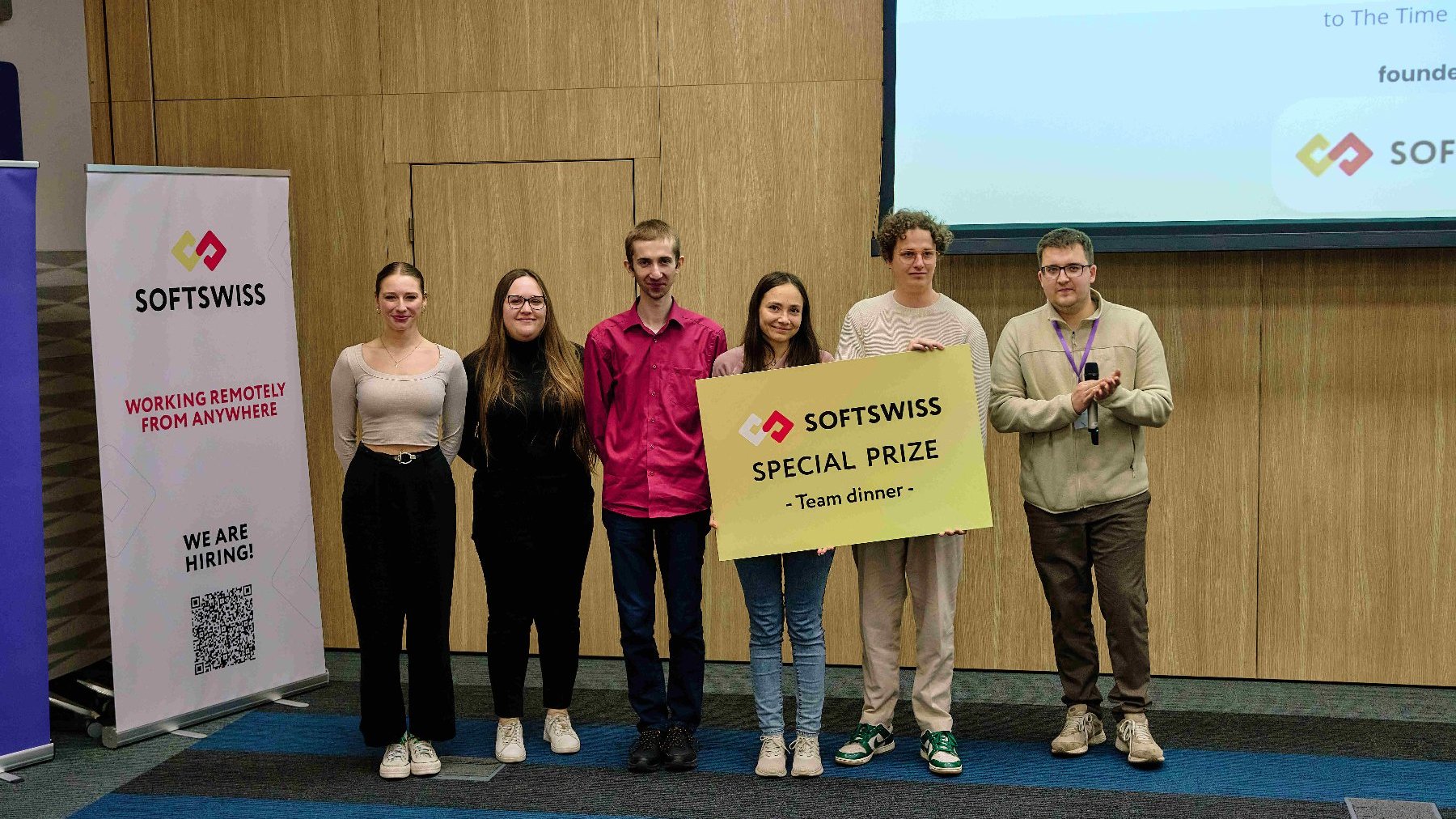 The winning group poses with their voucher prize.