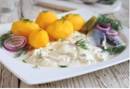 Śledzie w śmietanie - grafika artykułu