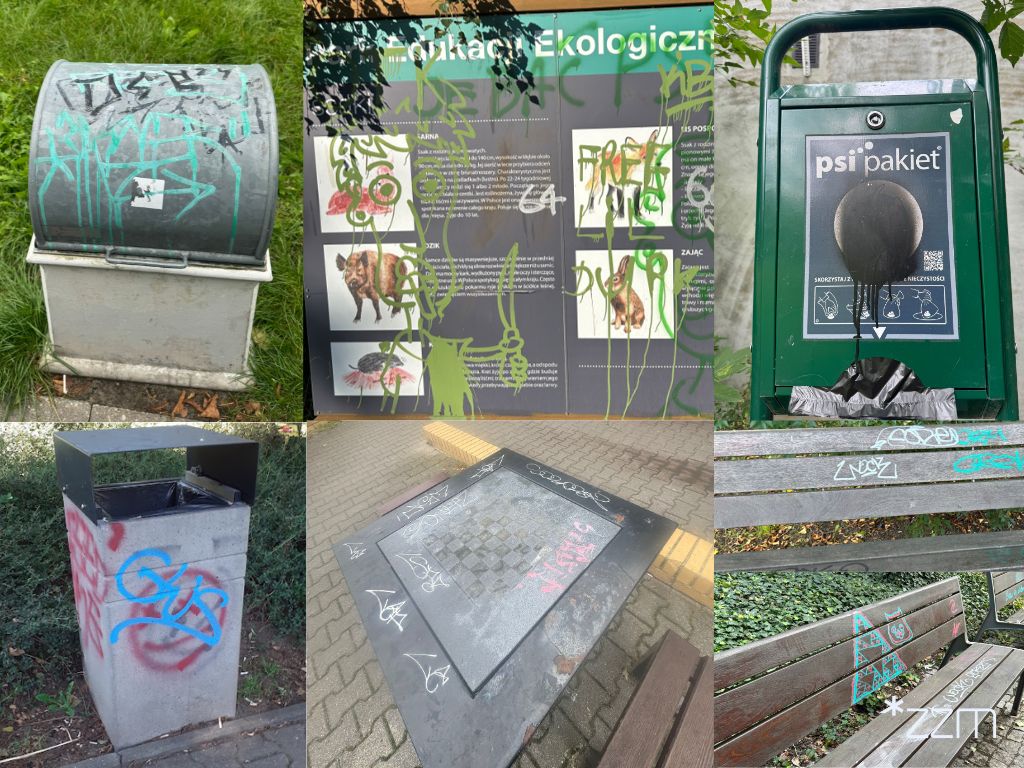 Zdjęcie przedstawia pomalowaną czerwoną farbą tablicę pamiątkową.