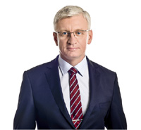 Profile picture of Mayor of Poznan. Men with glasses, silver hair wearing a navy suit and a claret tie.