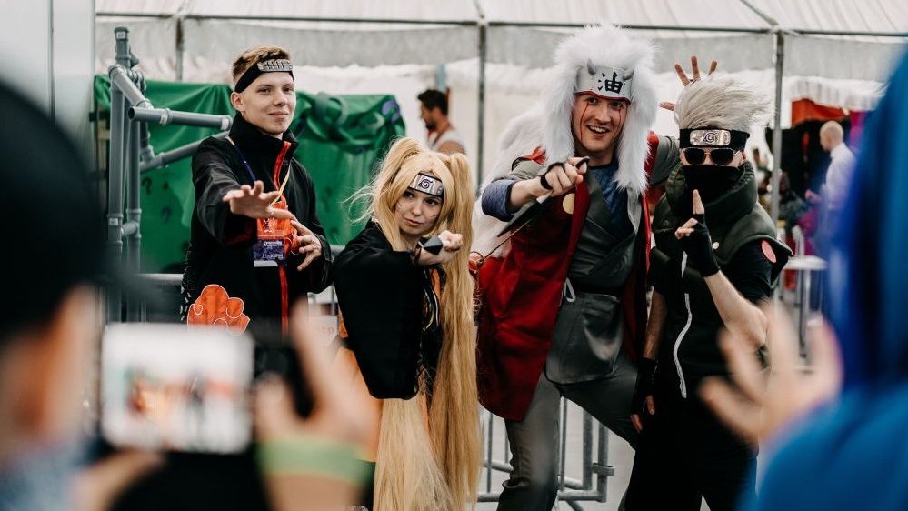 Photo of four young people in disguises.