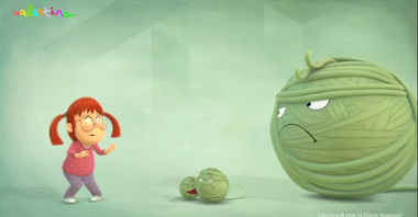 Drawing of a girl, who looks frightened and who stands opposite a big green ball resembling a ball of wool with a sad facial expression. Between a girl and a big ball two small green balls.