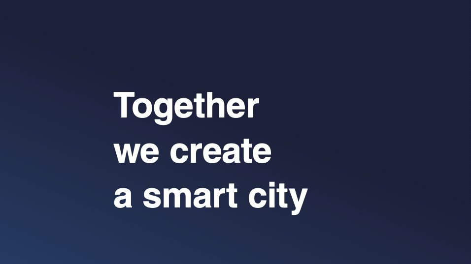 It reads "Together we create a smart city", white letters, navy blue background.