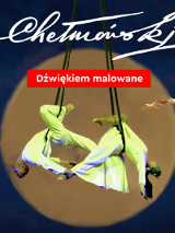 Para akrobatów wisząca w powietrzu na taśmach. Za nimi w tle zółty okrąg. Ciemne, niebieskie tło. Wokół kilka lecących ptaków. Tytuł wydarzenia.