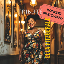 Zdjęcie, piosenkarka w kwiecistej sukience stoi w holu. Na ścianach wiszą obrazy. Na zdjęciu napisy informujace o wydarzeniu.