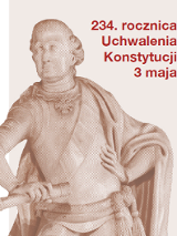 Pomnik przedstawiający postać w historycznym stroju trzymającą zwój dokumentu, po lewej stronie. Po prawej stronie czerwony napis: 234. rocznica Uchwalania Konstytucji 3 maja.