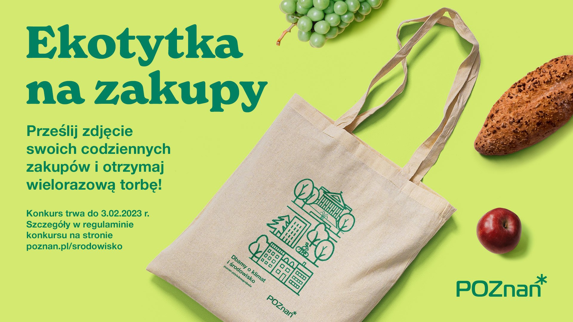 Na zdjęciu znajdują się napisy związane z konkursem Ekotytka na zakupy, torba materiałowa na zakupy, jabłko, zielone winogrona i bułka, na zielonym tle. - grafika artykułu