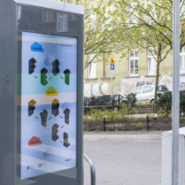 Na zdjęciu totem multimedialny na Wildzie a na min kadr z wystawy Fest Fyrtel.